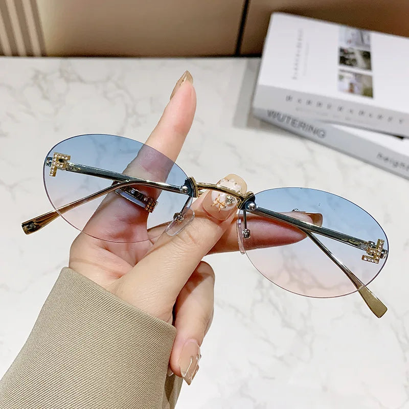 Fashion Oval Frameless Sunglasses Women Sparkling Rhinestone F Design Luxury Sun Glasses Girls shopping travelling eyeglasses