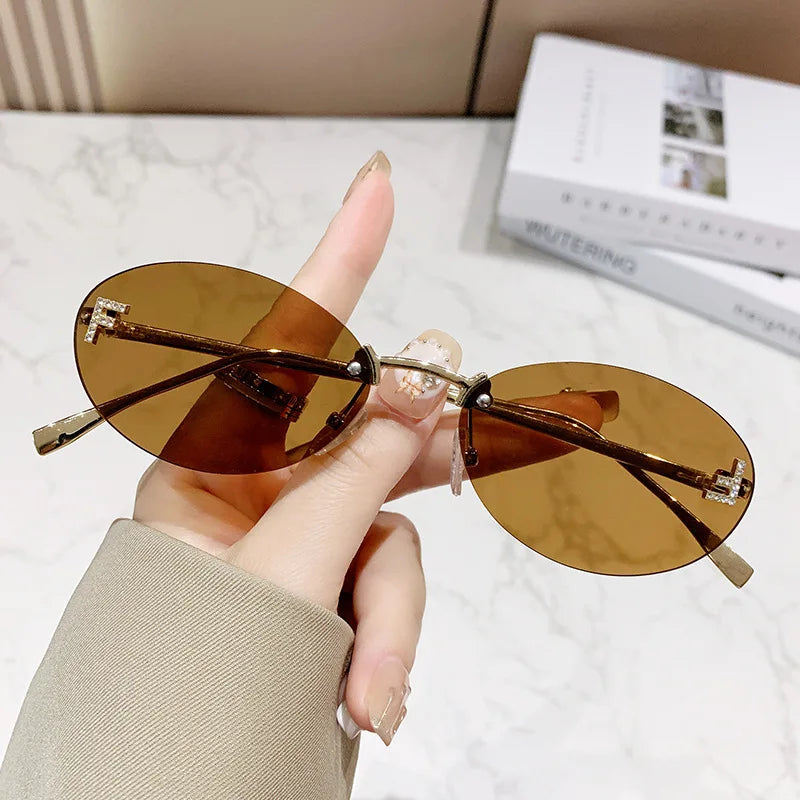 Fashion Oval Frameless Sunglasses Women Sparkling Rhinestone F Design Luxury Sun Glasses Girls shopping travelling eyeglasses