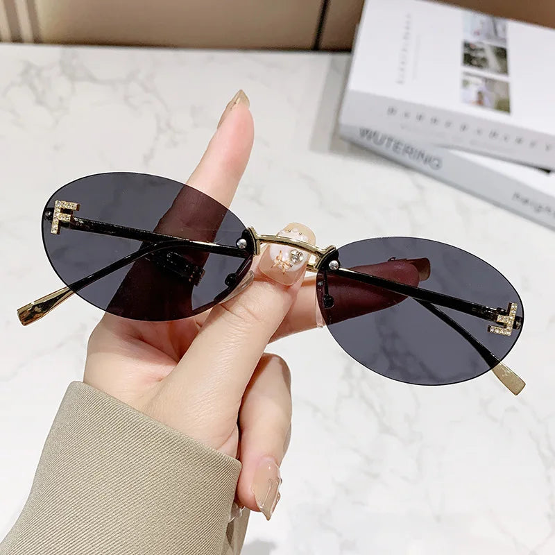 Fashion Oval Frameless Sunglasses Women Sparkling Rhinestone F Design Luxury Sun Glasses Girls shopping travelling eyeglasses