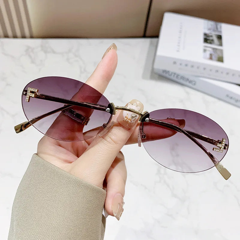 Fashion Oval Frameless Sunglasses Women Sparkling Rhinestone F Design Luxury Sun Glasses Girls shopping travelling eyeglasses