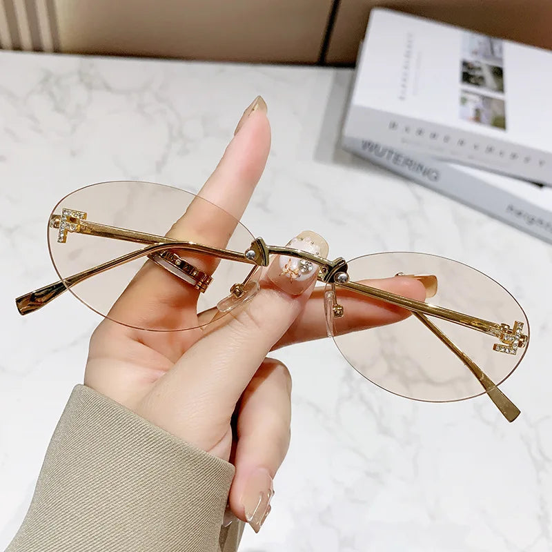 Fashion Oval Frameless Sunglasses Women Sparkling Rhinestone F Design Luxury Sun Glasses Girls shopping travelling eyeglasses